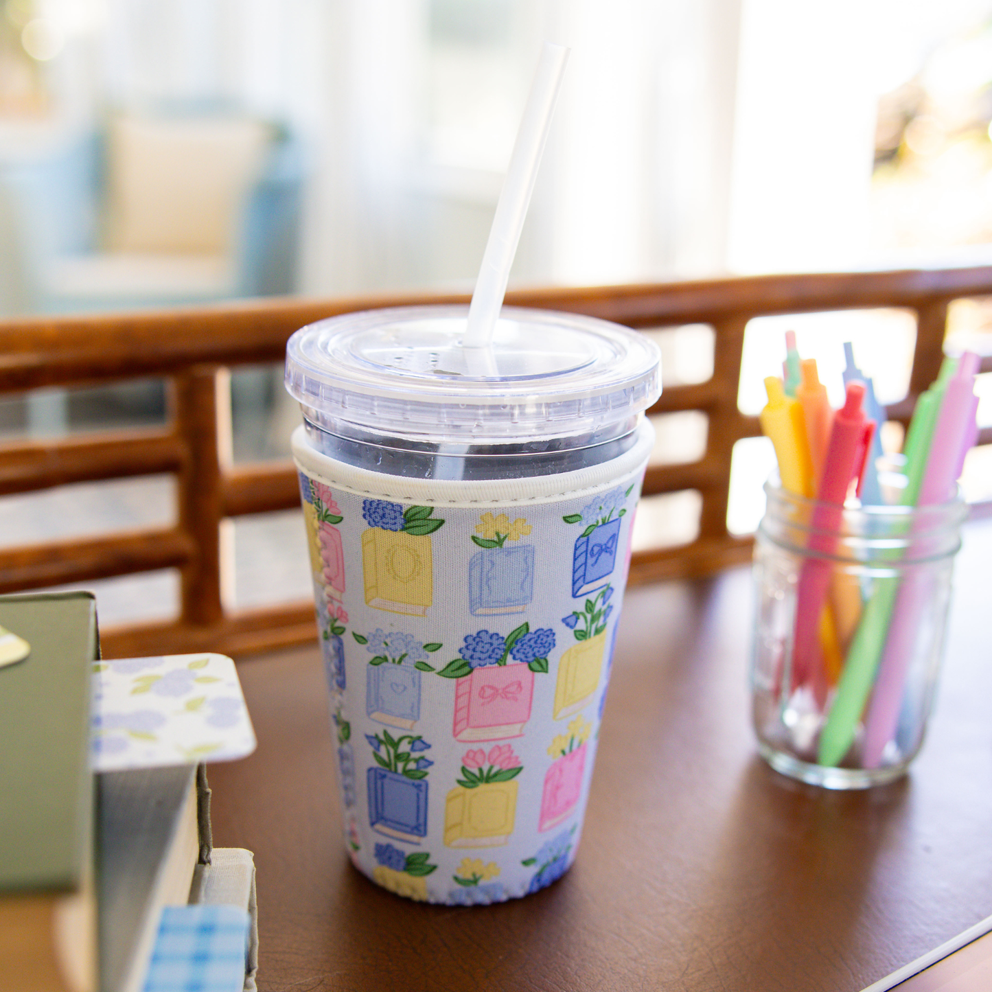 Spring Books | Reusable Coffee Sleeve